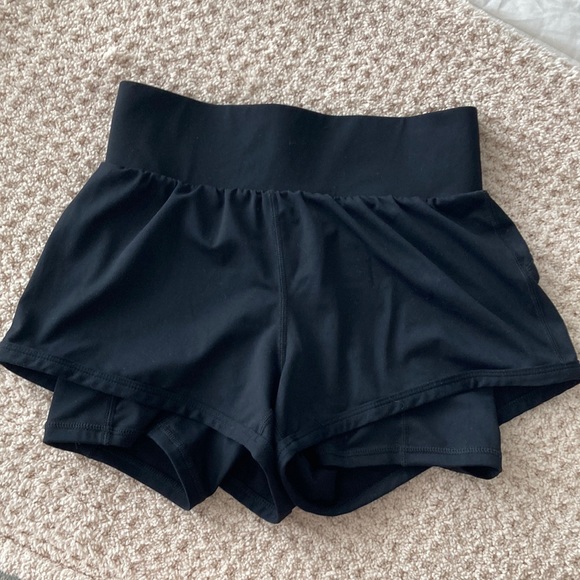 Fabletics Perforated Run Shorts - Picture 2 of 5